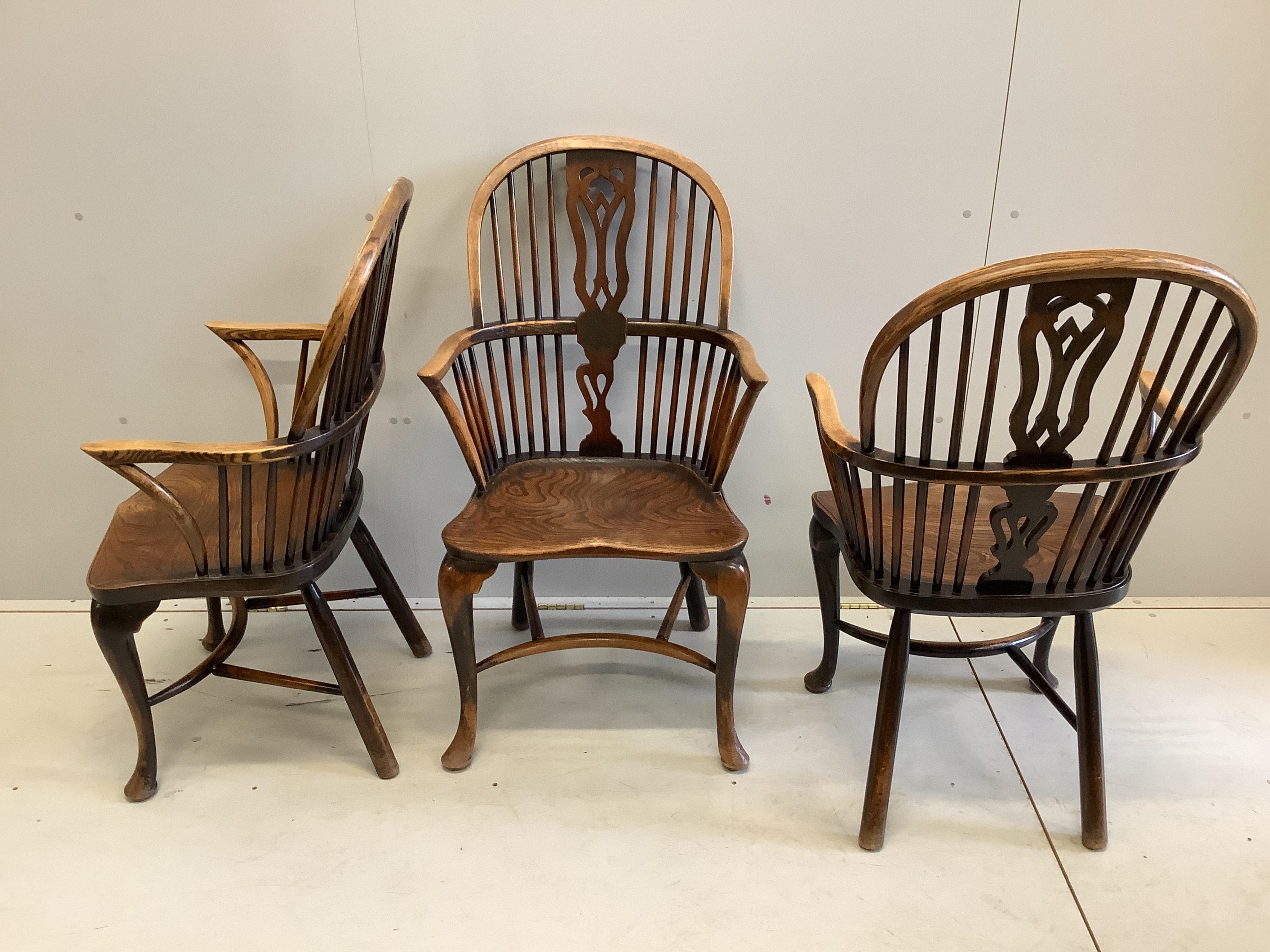 Six (three plus three) reproduction elm and beech Windsor armchairs, larger width 60cm, height 106cm. Condition - poor to fair